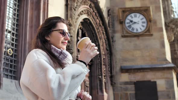 Medium Shot Female Tourist Drinking Paper Coffee Cup Admiring Amazing Medieval Architecture