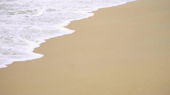 Waves on a Sandy Beach