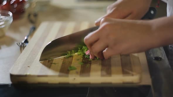 Woman Hands Chopping Green Vegetable Salad on Cutting Board, Vegetarian Food