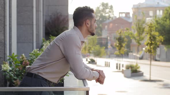 Happy Pensive Successful Relaxed Business Man Hispanic Guy Male Arabic Investor Businessman Stands