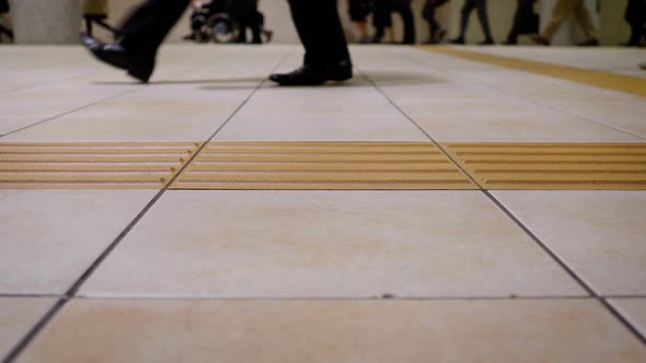 Low Angle Japanese Commuters Walking