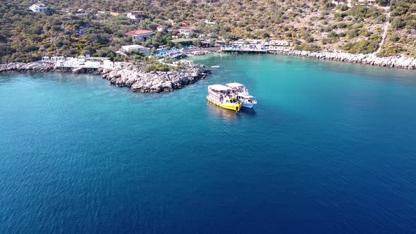 Drone shot of the boats at the sea.