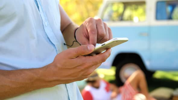 Close-up of man hands using a smartphone