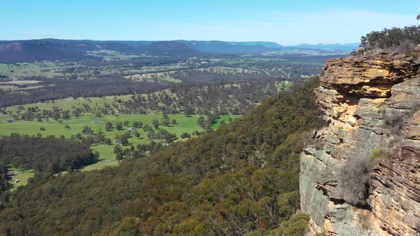 Aerial footage of Hassans Wall rock formation in regional New South Wales in Australia