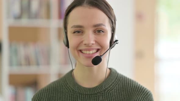 Call Center Woman Smiling at the Camera, Headset