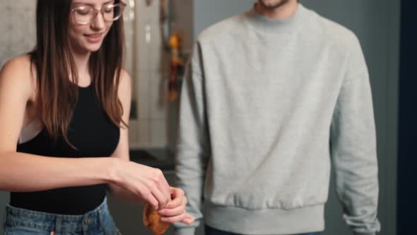 Young Happy Active Family Couple Dancing Laughing Together Preparing Food at Home, Carefree Joyful