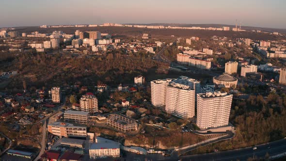 Establishing Orbiting Aerial Shot of Chisinau Moldova at Sunset