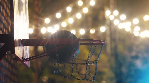 Basketball Ball Getting in the Hoop on Outdoor Playground