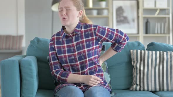 Young Woman Having Back Pain