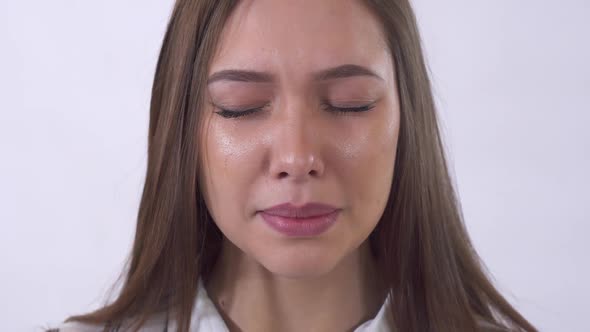 Portrait of Sad Young Woman Crying