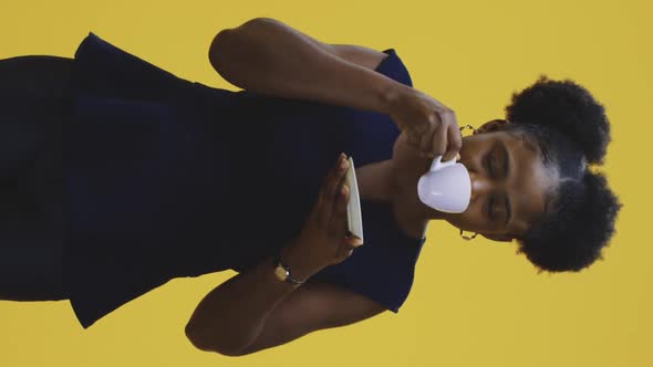 Young Woman Drinking Coffee