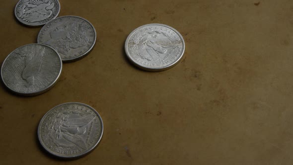 Rotating stock footage shot of antique American coins 