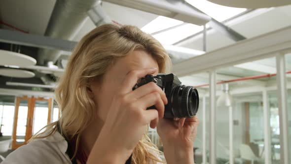 Young woman working in a creative office