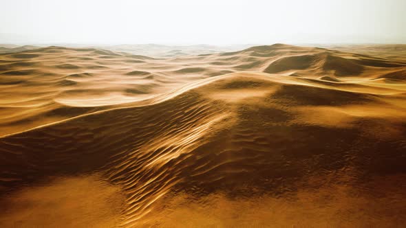 Sunset Over the Sand Dunes in the Desert