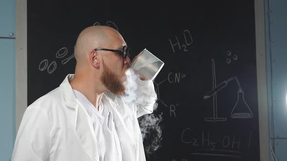 A Chemical Scientist Puts Liquid Nitrogen in His Mouth for an Experiment and Releases White Smoke