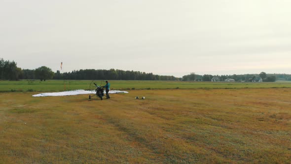 Aerial View of Paragliding Tandem Preparing To Take Off