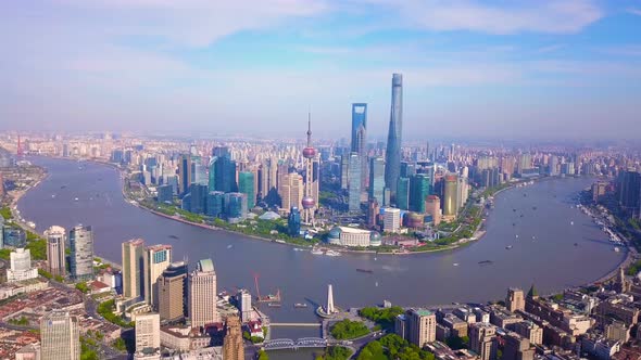 Aerial view of skyscraper and high-rise office buildings in Shanghai, Huangpu River, China.