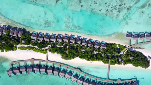 Drone aerial seascape of tourist beach by blue sea with sand background