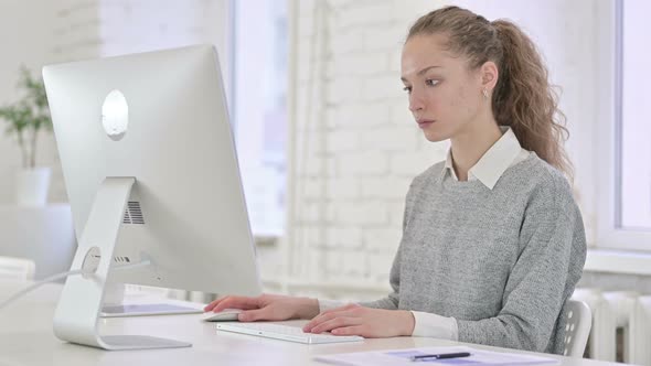 Beautiful Young Latin Woman Standing Up and Going Away in Office 