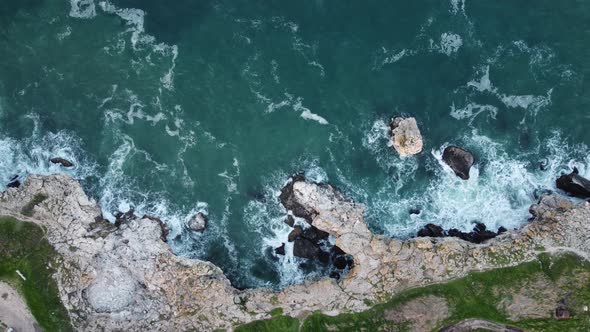 Aerial View of Sea Waves and Fantastic Cliffs Rocky Coast