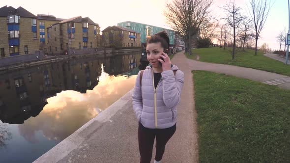 Young woman enjoying a walk at park