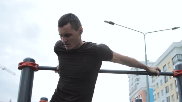 Man training outdoors on sports field