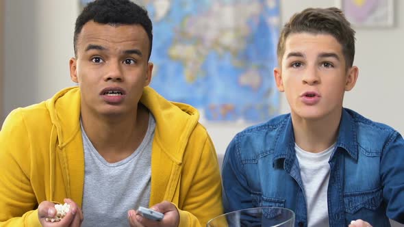 Two College Boys Watching Their Favorite Team Scoring on Tv, Sports Competition