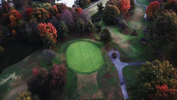 4k Aerial View of Drone Flying above the stunning colorful treetops in Louisville on Autumn Morning