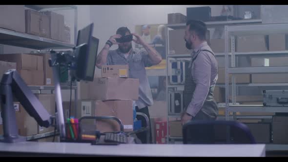 Workers in Distribution Center Playing with VR Headset
