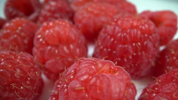 Ripe Fresh Natural Raspberries in Extreme Macro Close Up