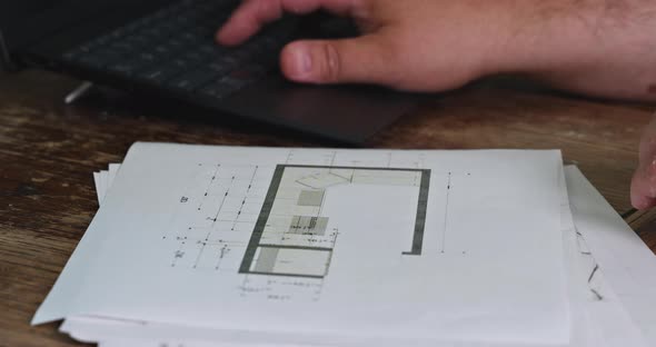 Engineers Architects Working Planing Measuring Layout of Building Blueprints of Kitchen Plans