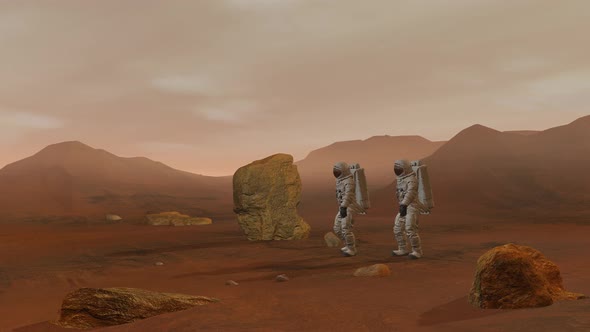 Two Astronauts Wearing Space Suit Walking On The Surface Of Mars alt