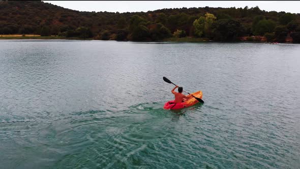 Young man doing kayak