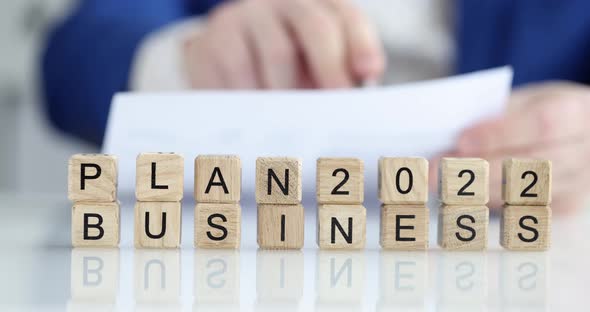 Businessman Planning a Business Plan for 2022 and Successful Strategy