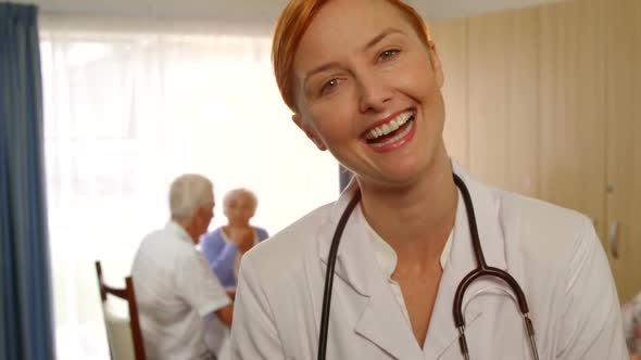 Portrait of female doctor in a retirement home