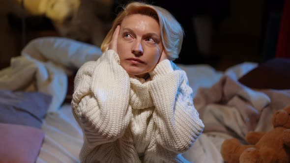 Exhausted Frightened Anxious Woman Covering Ears with Hands Looking Up Listening to Air Raid Alert