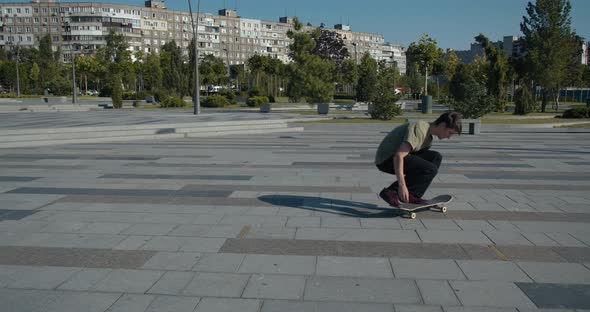 Skateboarding Tricks Done By a Skater Boy on a Sunny Morning, 