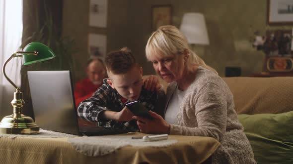 Teen Grandson with Grandmother on Couch