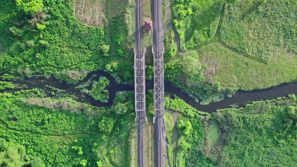 Metal Railway Train Bridge Over the River