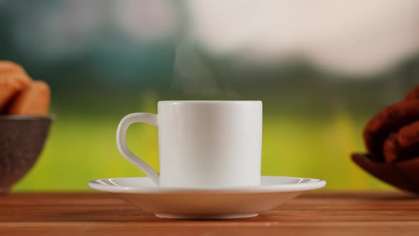 Hot Drink in White Cup on a Wooden Table