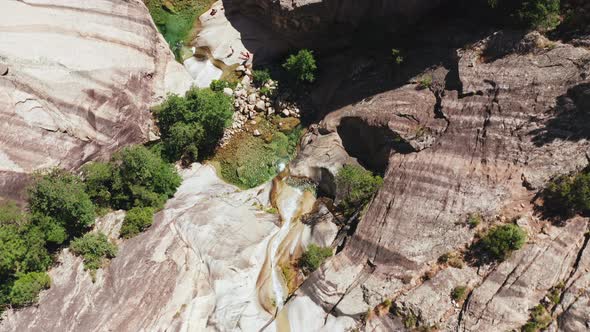 Aerial View of Little Waterfall Natural Swimming Pool Trees on the White Rock