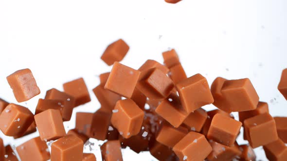 Super Slow Motion Shot of Salted Caramel Explosion Isolated on White Background at 1000Fps