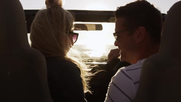 Couple in love enjoying free time on road trip together