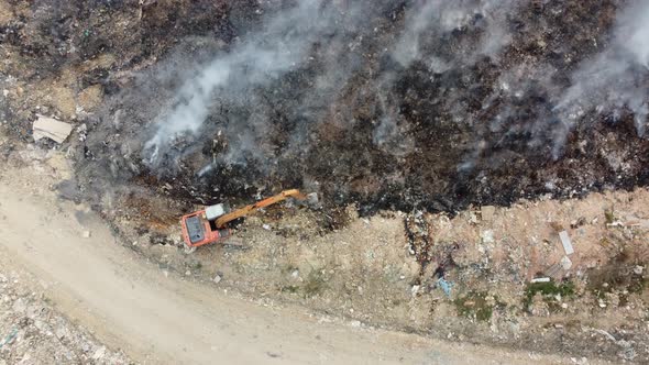 Aerial top down view excavator stop fire spread