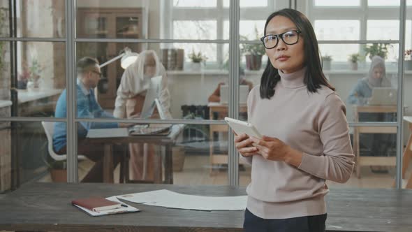 Portrait of Asian Businesswoman in Office