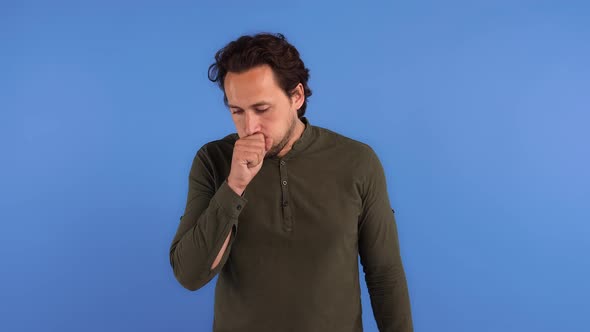 Male in Khaki Colored Shirt
