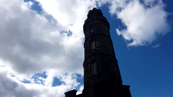Timelapse of old tower with clouds moving past. Edinburgh Scotland