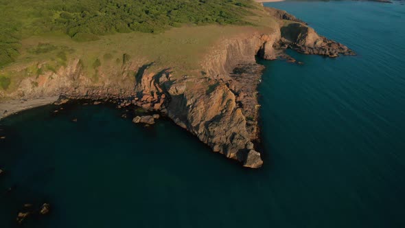 Drone flight around a picturesque rocky coastline