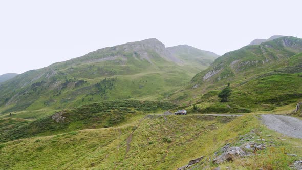 Car driving on road in highlands