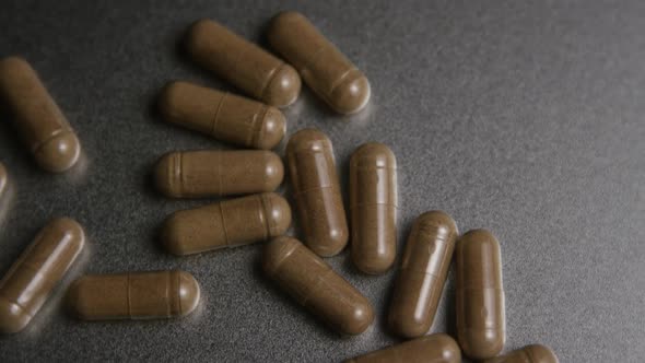 Rotating stock footage shot of vitamins and pills